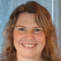 Kvinne som smiler