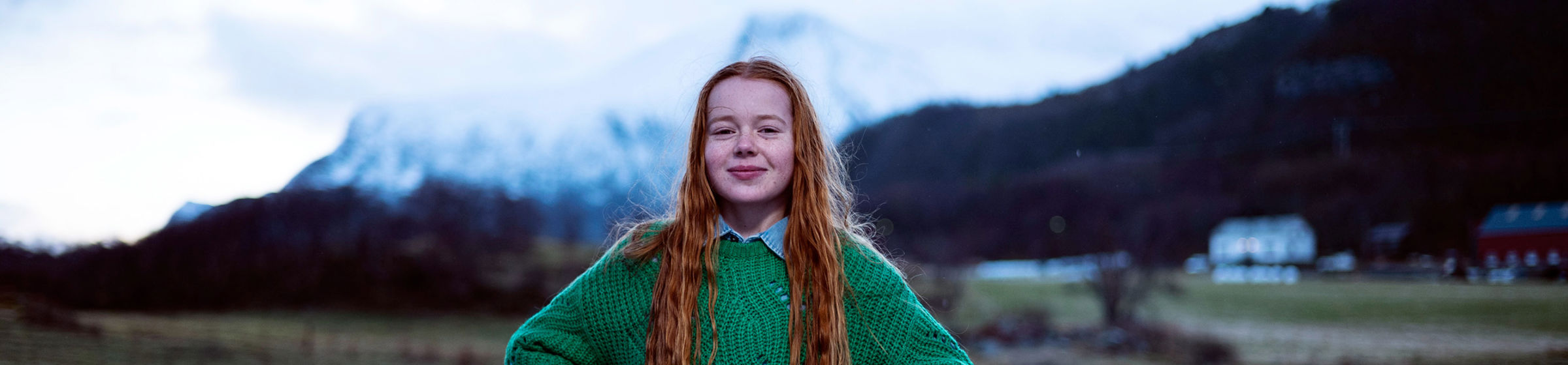 Girl in green sweater