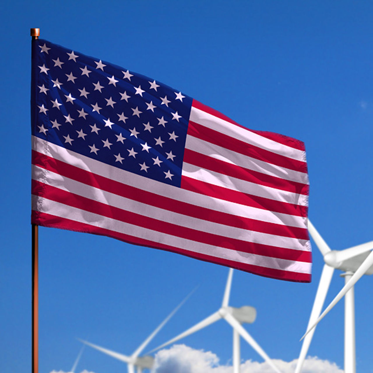 USAs flagg med vindturbiner i bakgrunnen