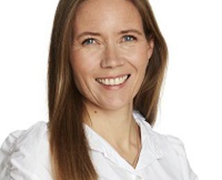 Kvinne som smiler