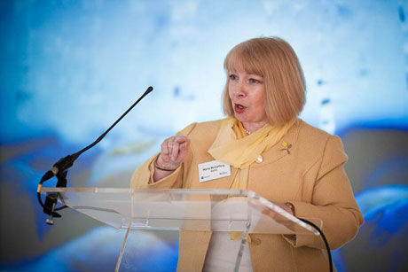Maria McCaffery from British Wind Energy Association holding a speeach