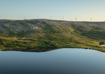 Fjellandskap i solnedgang
