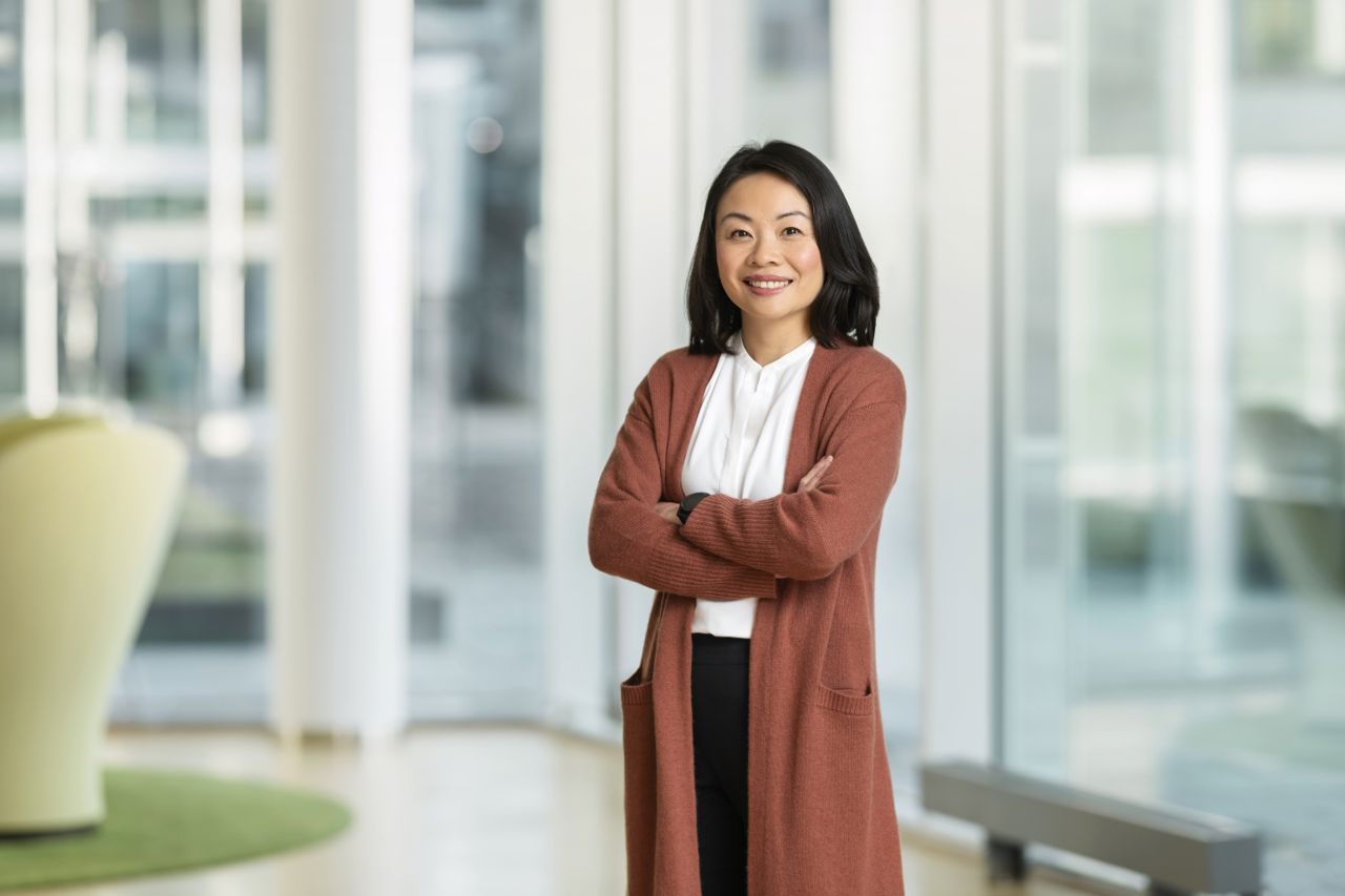 Woman smiling with arms crossed